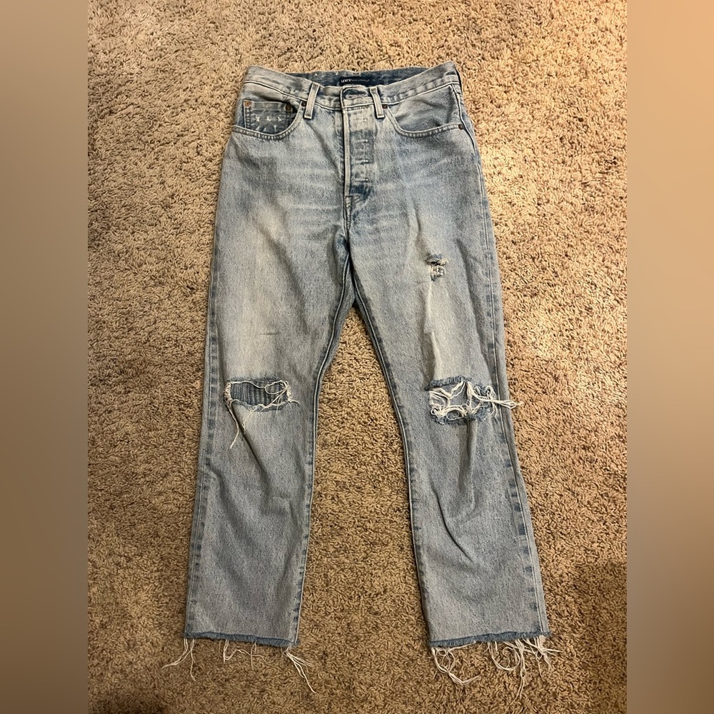 High waisted Levi jeans, distressed look